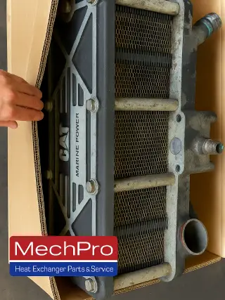 MechPro Caterpillar C-18 Heat Exchanger plate service