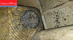 Marine vessel Plate heat exchanger port clogged with mussels and debris