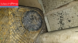 Marine vessel Plate heat exchanger port clogged with mussels and debris